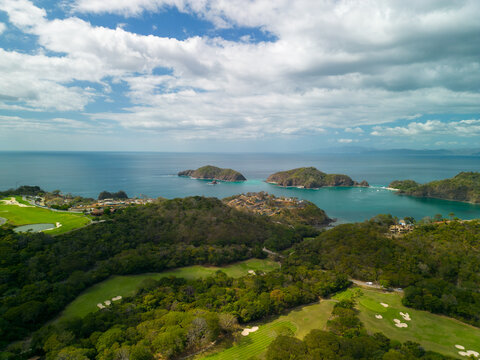 Aerial view of Guanacaste's lush green forests surrounding the Gulf of Nicoya in Costa Rica