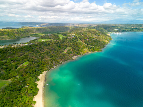 Aerial view of Guanacaste's lush green forests surrounding the Gulf of Nicoya in Costa Rica