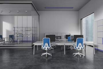 Stylish office interior with coworking and glass meeting room, window