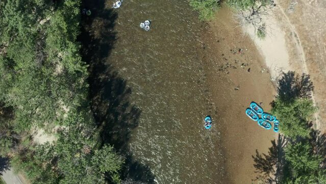 Drone footage of people floating down boise river in summer