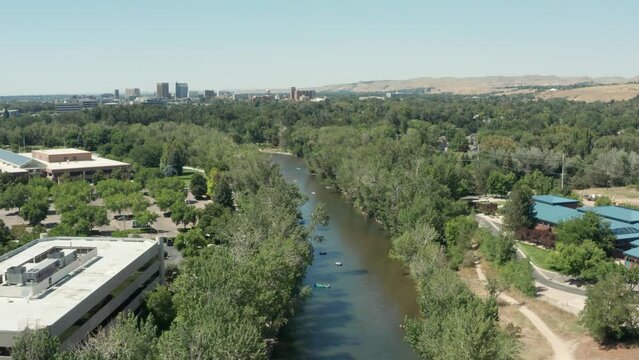 Drone footage of people floating down boise river in summer