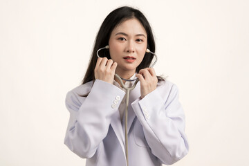 Portrait of happy asian female doctor wearing medical uniform and stethoscope at hospital.Beautiful...