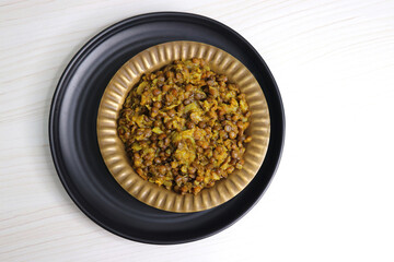 Akkha Masoor is an Indian dish cooked with whole red lentils, spices, onions, tomatoes, garlic, and ginger. Rich, flavorful, and nutritious. Enjoy with rice or bread. masoor usal. masur chi bhaji