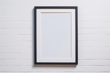 Bright and clean frame mockup against a minimalist white wall, complemented by a soft, inviting decor,