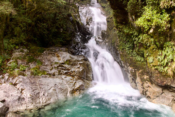View of Christie Falls on the Milford Sound Highway towards Milford Sound, Fiordland, New Zealand