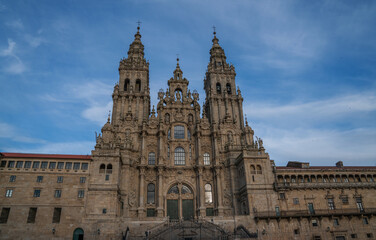Fototapeta premium Historic building in old town. House facade of old historical building with windows. Exterior design of building with ornamental details.