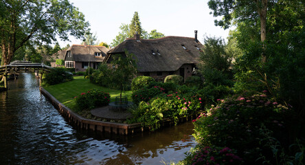 Typical houses of Giethoorn, Netherlands with gardens. Town is know as 