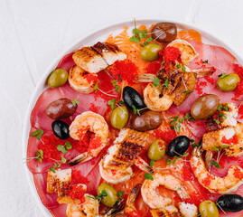 Exquisite seafood platter with shrimp and caviar