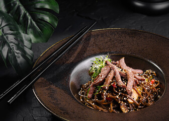 Asian beef stir-fry on elegant plate
