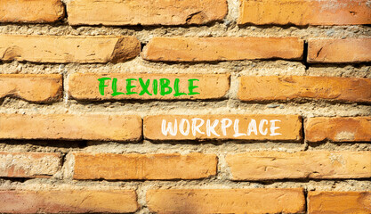 Flexible workplace symbol. Concept words Flexible workplace on beautiful brick wall. Beautiful red brown brick wall background. Business Flexible workplace concept. Copy space.