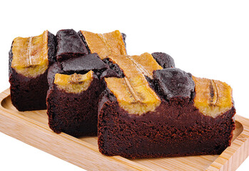 Chocolate banana bread slices on wooden board