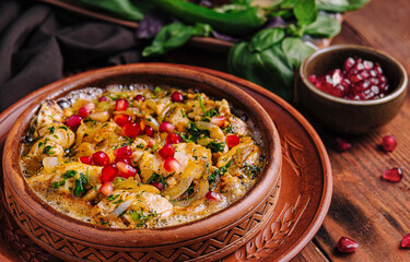 Savory shrimp hummus plate with pomegranate