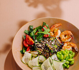 Fresh prawn salad with vegetables and sesame