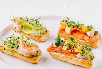 Gourmet bruschetta platter on white background