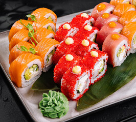 Assortment of fresh sushi rolls on elegant plate