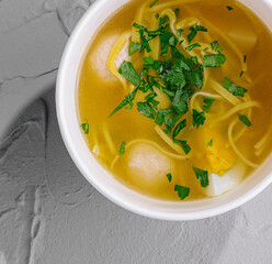 Homemade chicken noodle soup in bowl