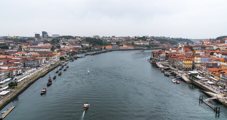 Panoramic view of Porto and the Douro River, Portugal. Boats with porto wine.