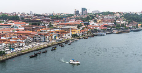 Panoramic view of Porto and the Douro River, Portugal. Boats with porto wine.