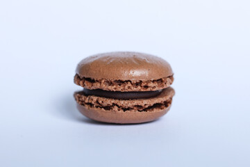 a single chocolate Macaroon isolated on white background.	