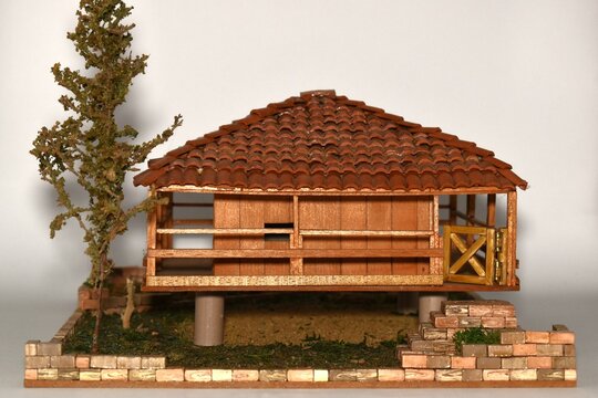 Model of an asturian horreo with white background, isolated.