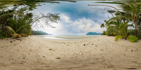 Spherical panorama of 360 degrees of sandy beach with palm trees on tropical island in ocean or sea.