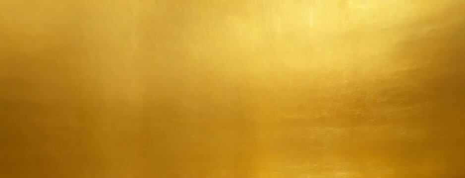 Bright gold textured background with a smooth, shiny finish and soft reflections.
