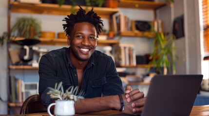 Fototapeta na wymiar Smiling Man with His Laptop