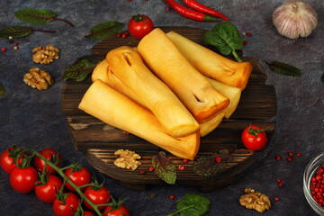 Smoked cheese on black background