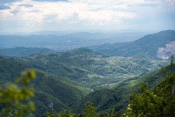 Naklejka premium Ovcar and Kablar mountains new West Morava river in Serbia, view of natural park, rocks, trees and fields of grass. Protected Serbian natural park.