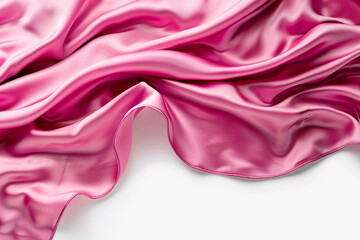  A hot pink silk fabric elegantly draped in a wave-like pattern over a pure white background