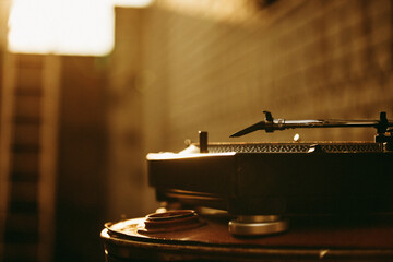 Vinyl records as part of history and a revived musical tradition today. Vinyl in a cafe, playing in...