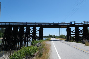 Fototapeta premium A bridge is a structure built to span a physical obstacle, such as a body of water, a valley, or a road, without blocking the path underneath.