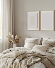  small blank wooden frames on the wall above the bed, cozy bedroom with white walls, beige and light grey interior decor, window in the background