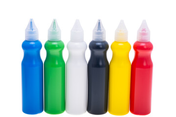 colored paint in a bottle isolated