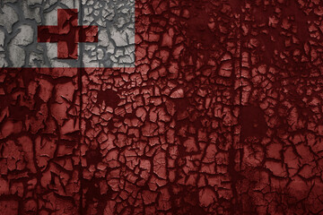 flag of Tonga on a old grunge metal rusty cracked wall background