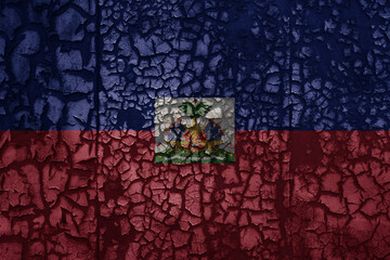 flag of haiti on a old grunge metal rusty cracked wall background - obrazy, fototapety, plakaty