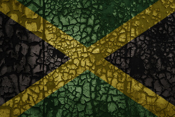 flag of jamaica on a old grunge metal rusty cracked wall background
