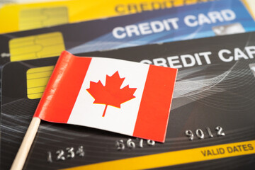 Credit card model with Canada flag, financial investment economy business banking.