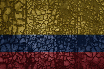flag of colombia on a old grunge metal rusty cracked wall background