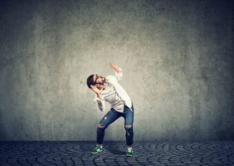 Young man afraid of imaginary things 