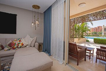 Interior design of luxury apartment living room with patio