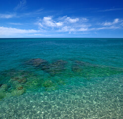 Beautiful transparent sea with blue sky