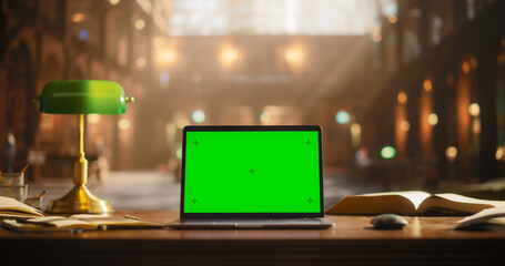Laptop Computer with Green Screen Mock Up Chromakey Display Standing on a Wooden Table in an...