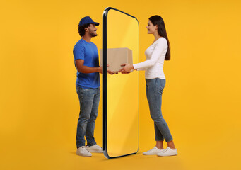 Courier delivering parcel to woman through huge smartphone on orange background