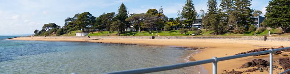 Panoramic scenery of Cowes beach in Phillip Island, VIC Australia. Panorama view of the beautiful coastline over Cowes Pier.