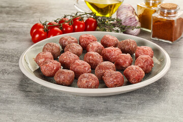 Uncooked raw beef meatball minced