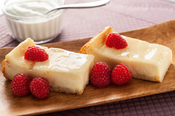 homemade cheesecake with raspberries