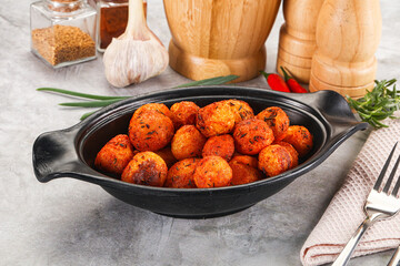 Baked young potato with paprika