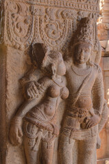 Stone carved divine couple. temples and shrines at Pattadakal temple complex, 7th century, Karnataka, India.