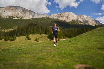 Mature trail runner in the mountains